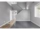 Open-concept entryway with staircase, featuring wood floors and neutral walls at 3869 S Himalaya Way, Aurora, CO 80013
