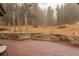 Spacious outdoor deck perfect for entertaining, featuring built-in planters and scenic views at 2720 S Spring Gulch Rd, Idaho Springs, CO 80452