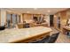 Well-appointed kitchen with stainless steel appliances, tile countertops, and center island with seating at 2720 S Spring Gulch Rd, Idaho Springs, CO 80452