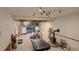 Open-concept living room with wood burning stove and a fireplace at 2720 S Spring Gulch Rd, Idaho Springs, CO 80452