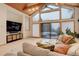 Cozy living room with a large window offering natural light and an exterior view at 2720 S Spring Gulch Rd, Idaho Springs, CO 80452