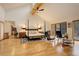 Spacious main bedroom with vaulted ceilings, wood floors, sitting area, and access to deck at 2720 S Spring Gulch Rd, Idaho Springs, CO 80452