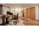 Bright office with hard wood floors, comfortable furniture, and natural light at 2720 S Spring Gulch Rd, Idaho Springs, CO 80452