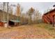 This property includes a well-kept storage shed that is nestled in the trees in the backyard at 2720 S Spring Gulch Rd, Idaho Springs, CO 80452