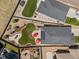 Overhead view of a fenced-in backyard with patio, landscaping, and a play area at 398 Midden Pl, Castle Rock, CO 80104