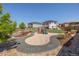 Picturesque backyard featuring a play area, manicured landscaping, and outdoor seating on the patio at 398 Midden Pl, Castle Rock, CO 80104