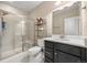 Modern bathroom featuring a glass-enclosed shower, sleek black vanity, and contemporary fixtures at 398 Midden Pl, Castle Rock, CO 80104