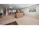 Open floor plan with cozy seating area, dining space, and kitchen, perfect for relaxation and entertaining at 398 Midden Pl, Castle Rock, CO 80104