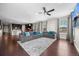 Spacious living room with a large sectional sofa, media setup, and an open-concept design at 398 Midden Pl, Castle Rock, CO 80104