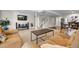 Spacious living room with comfortable couches, and an entertainment area with a TV and speakers at 398 Midden Pl, Castle Rock, CO 80104