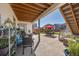 Covered patio with a seating area, perfect for outdoor entertaining at 398 Midden Pl, Castle Rock, CO 80104