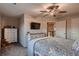 Inviting bedroom with neutral tones and ceiling fan at 4965 Malaya St, Denver, CO 80249