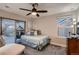 Cozy bedroom with sliding glass doors leading to a patio at 4965 Malaya St, Denver, CO 80249