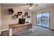 Bright office featuring custom shelving and a walkout patio at 4965 Malaya St, Denver, CO 80249