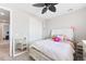 Comfortable bedroom with a plush bed, ample closet space, and soft, neutral decor at 23576 E 5Th Pl, Aurora, CO 80018