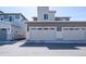 Two-car garage exterior with contemporary-style architecture at 23576 E 5Th Pl, Aurora, CO 80018