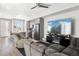 Open concept living area with kitchen, dining, and entertainment spaces for modern living at 23576 E 5Th Pl, Aurora, CO 80018