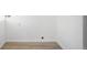 Utility area featuring white walls and durable flooring at 461 S Lowell Blvd, Denver, CO 80219