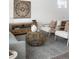 Serene living room featuring a modern table, two chairs, and neutral decor that creates a clean and inviting atmosphere at 461 S Lowell Blvd, Denver, CO 80219