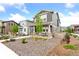Attractive home featuring manicured landscaping and a cozy front porch at 8057 Monte Vista Cir, Littleton, CO 80125