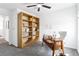 Office space featuring contemporary desk, shelving, and a comfortable chair at 8057 Monte Vista Cir, Littleton, CO 80125
