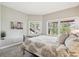 Comfortable bedroom with scenic outdoor views and modern decor at 20496 Stonewood Trl, Morrison, CO 80465
