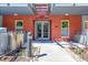 Apartment building entrance with well-maintained landscaping and easy access on a sunny day at 1438 Little Raven St # 201, Denver, CO 80202