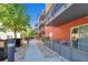 Apartment courtyard with walkways, manicured landscaping, and common areas for residents at 1438 Little Raven St # 201, Denver, CO 80202