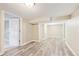 Spacious finished basement featuring new flooring, neutral paint, and an open layout for versatile use at 6953 Elati Way, Denver, CO 80221
