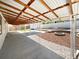 Large covered patio with fire pit and well maintained landscaping, perfect for entertaining at 5480 W 74Th Ave, Arvada, CO 80003