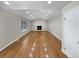 Bright living room featuring hardwood flooring, recessed lighting, and a cozy fireplace at 5480 W 74Th Ave, Arvada, CO 80003