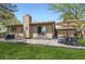 Well-maintained backyard with patio area, outdoor furniture, and a grill at 904 Fieldstone Pl, Highlands Ranch, CO 80126