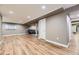 Open basement area with recessed lighting, wood floors and neutral wall colors at 904 Fieldstone Pl, Highlands Ranch, CO 80126
