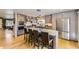 Stylish kitchen with stainless steel appliances, granite countertops, and a functional island with bar seating at 904 Fieldstone Pl, Highlands Ranch, CO 80126