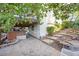 Backyard area offering a beautiful patio, hot tub, and access to the deck above at 3087 Deer Creek Trl, Highlands Ranch, CO 80129