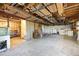 Unfinished basement with concrete floors, exposed beams, and potential for customization at 3087 Deer Creek Trl, Highlands Ranch, CO 80129