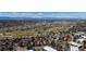Scenic aerial view of neighborhood near golf course, lakes and mountains in the distance at 2525 S Dayton Way # 2209, Denver, CO 80231