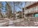 Building exterior with balconies and trees at 2525 S Dayton Way # 2209, Denver, CO 80231