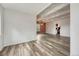 Inviting living space with exposed beam ceiling, hardwood floors, and an open floor plan at 2525 S Dayton Way # 2209, Denver, CO 80231