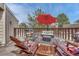 Inviting outdoor deck furnished with comfortable seating and a vibrant rug at 2525 S Dayton Way # 2209, Denver, CO 80231
