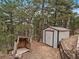 View of a shed with wooded surrounding at 26349 Pleasant Park Rd, Conifer, CO 80433