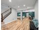 Finished basement with hardwood floors, neutral paint, stylish bar area, and comfortable seating at 17880 Weymouth Ave, Parker, CO 80134