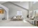 Spacious living room with vaulted ceilings, neutral colors, and plush seating at 12551 W 84Th Cir, Arvada, CO 80005