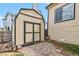The home features an exterior shed, perfect for storage at 12551 W 84Th Cir, Arvada, CO 80005