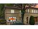 Elegant two-story home with a private courtyard, arched entryways, and a warm, inviting facade at 100 S University Blvd # 4, Denver, CO 80209