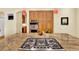 Gourmet kitchen with granite countertops, stainless steel appliances, and an island cooktop for culinary enthusiasts at 100 S University Blvd # 4, Denver, CO 80209