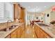 Modern kitchen featuring granite countertops, stainless steel appliances, custom cabinets, and an open layout at 100 S University Blvd # 4, Denver, CO 80209