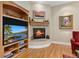 Close up of living room fireplace with custom built-ins and decorative mantel at 100 S University Blvd # 4, Denver, CO 80209