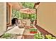 Cozy patio with outdoor seating, grill, and an umbrella for shade at 100 S University Blvd # 4, Denver, CO 80209