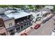 Charming building exterior with a rooftop patio, outdoor seating, and vibrant street-side appeal at 1426 S Pearl St, Denver, CO 80210